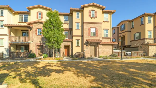 a front view of a building with a street