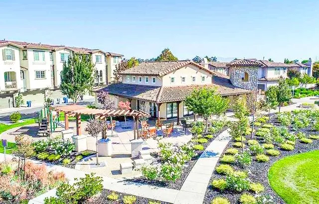 a front view of a building with an outdoor space