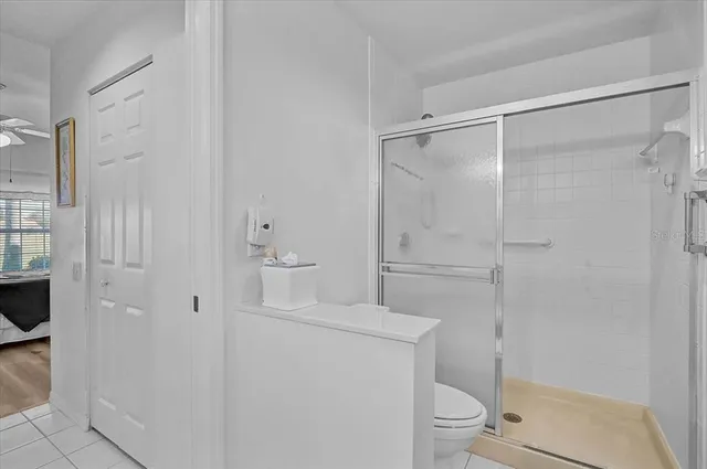 a view of a dining room with furniture and window