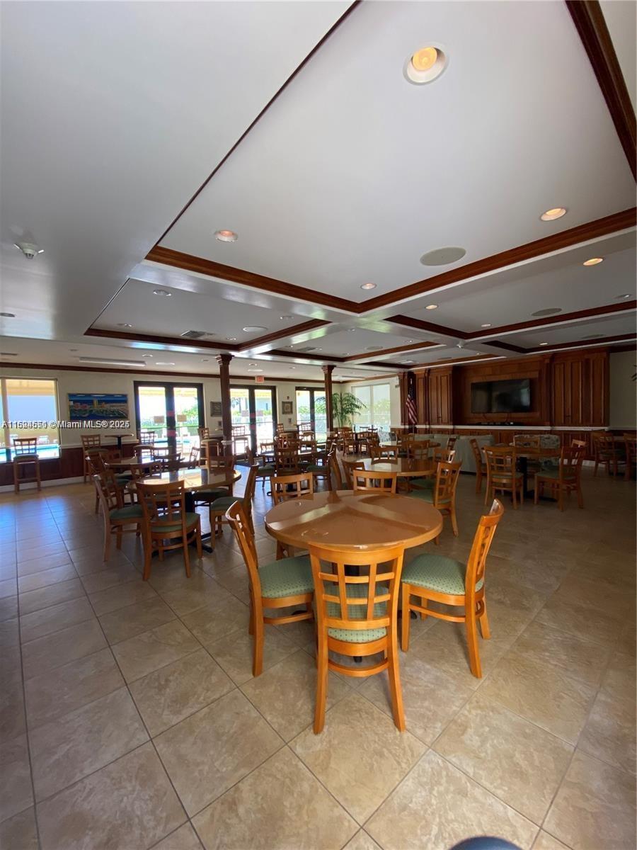 2800 North Ocean Drive, Unit B15C Riviera Beach, FL 33404 - Photo 24 of 32 a group of people sitting in a room