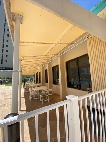 a view of a balcony with an outdoor space