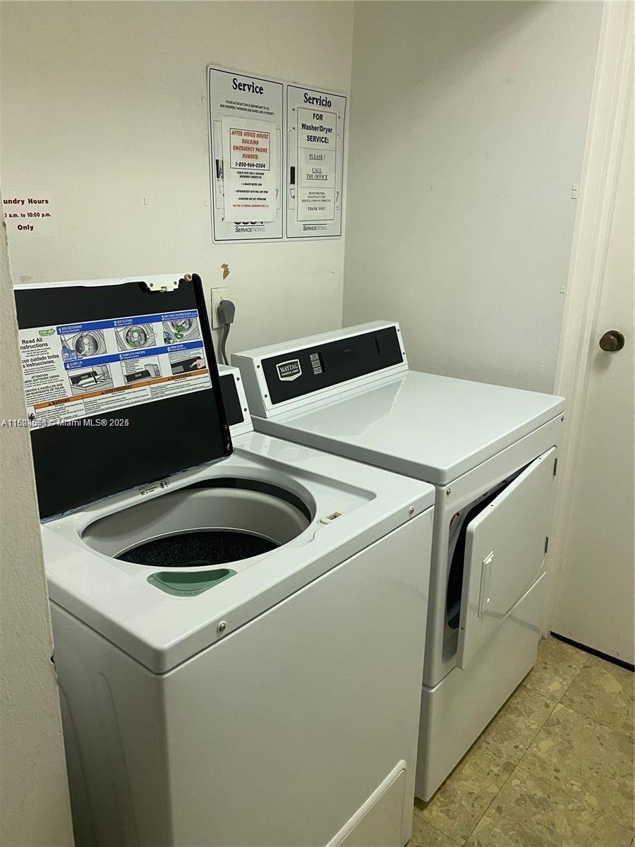 2800 North Ocean Drive, Unit B15C Riviera Beach, FL 33404 - Photo 30 of 32 a utility room with dryer and washer
