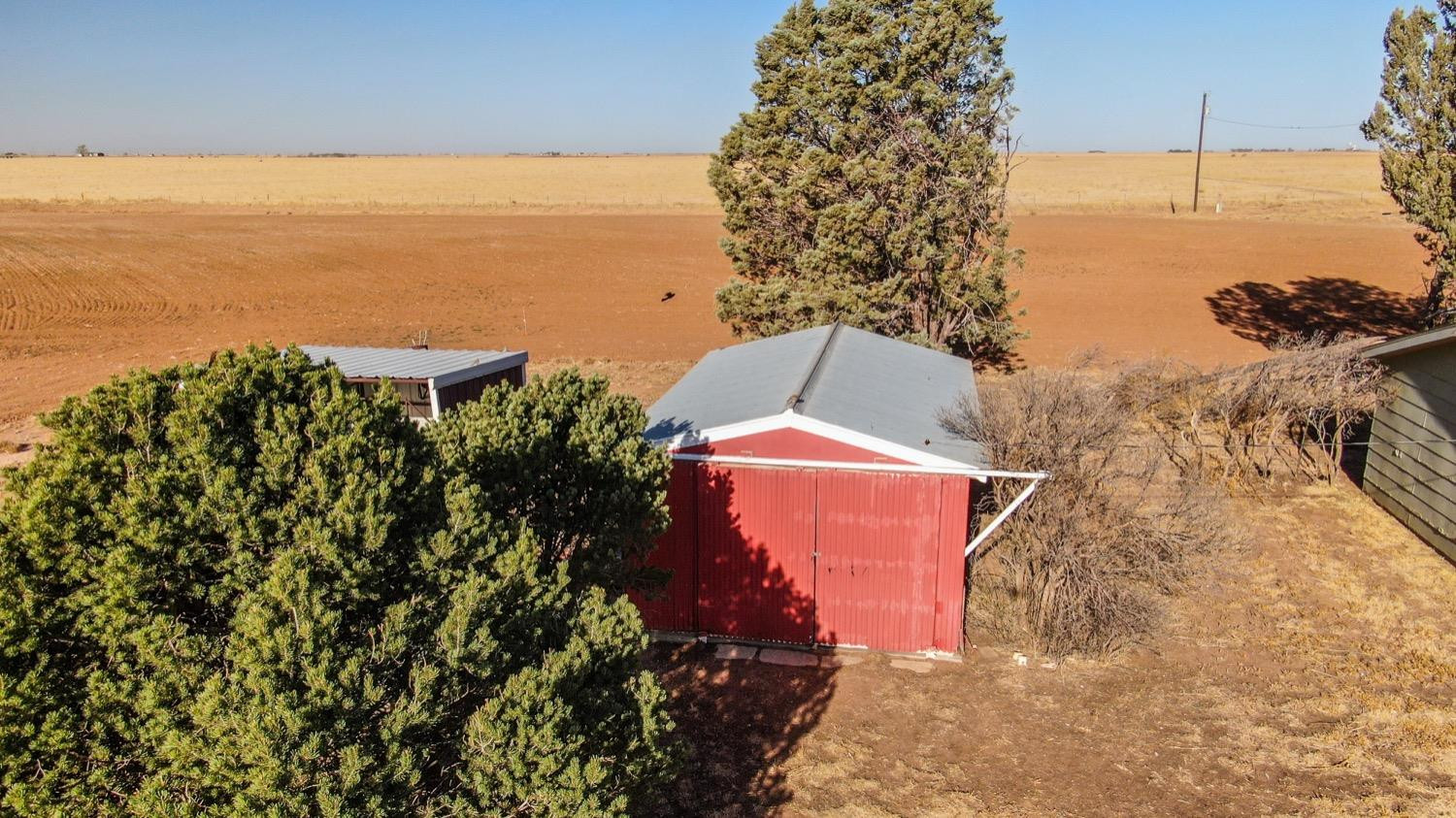 450 County Road 29 Muleshoe, TX 79347 - Photo 24 of 27 a view of a water with an outdoor space
