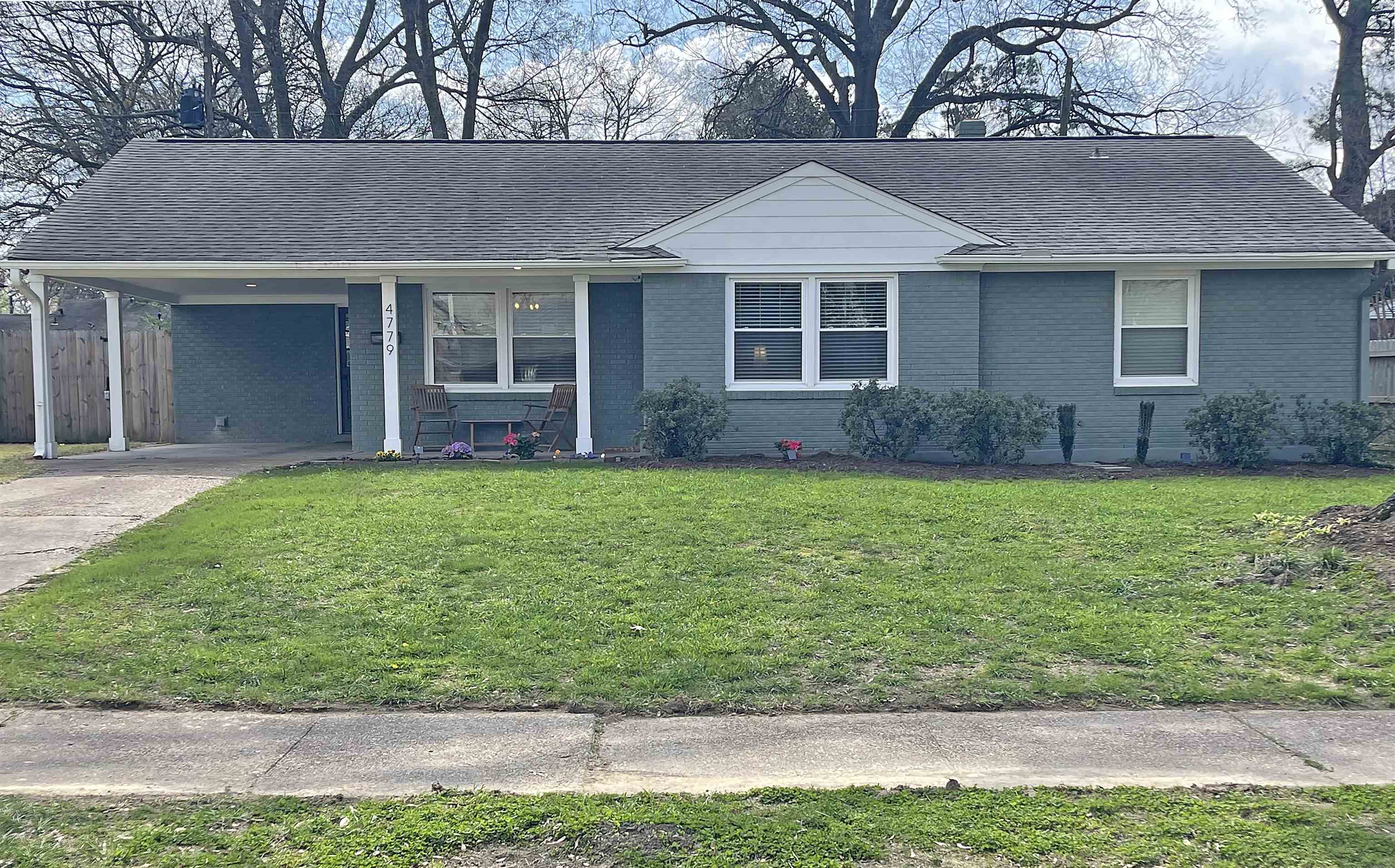 4779 Dee Road Memphis, TN 38117 - Photo 2 of 35 a front view of a house with garden