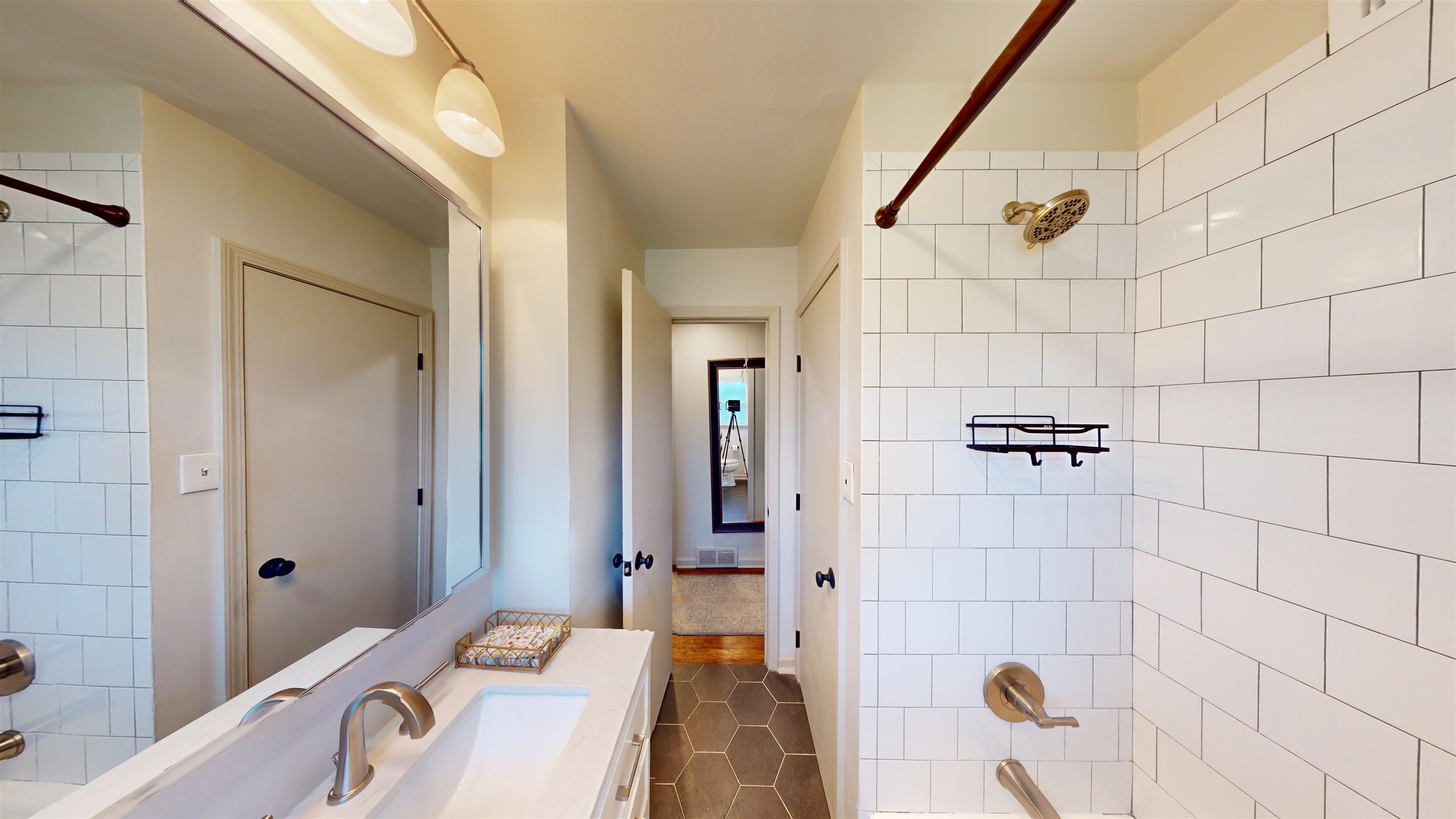 4779 Dee Road Memphis, TN 38117 - Photo 30 of 35 a bathroom with a tub and shower