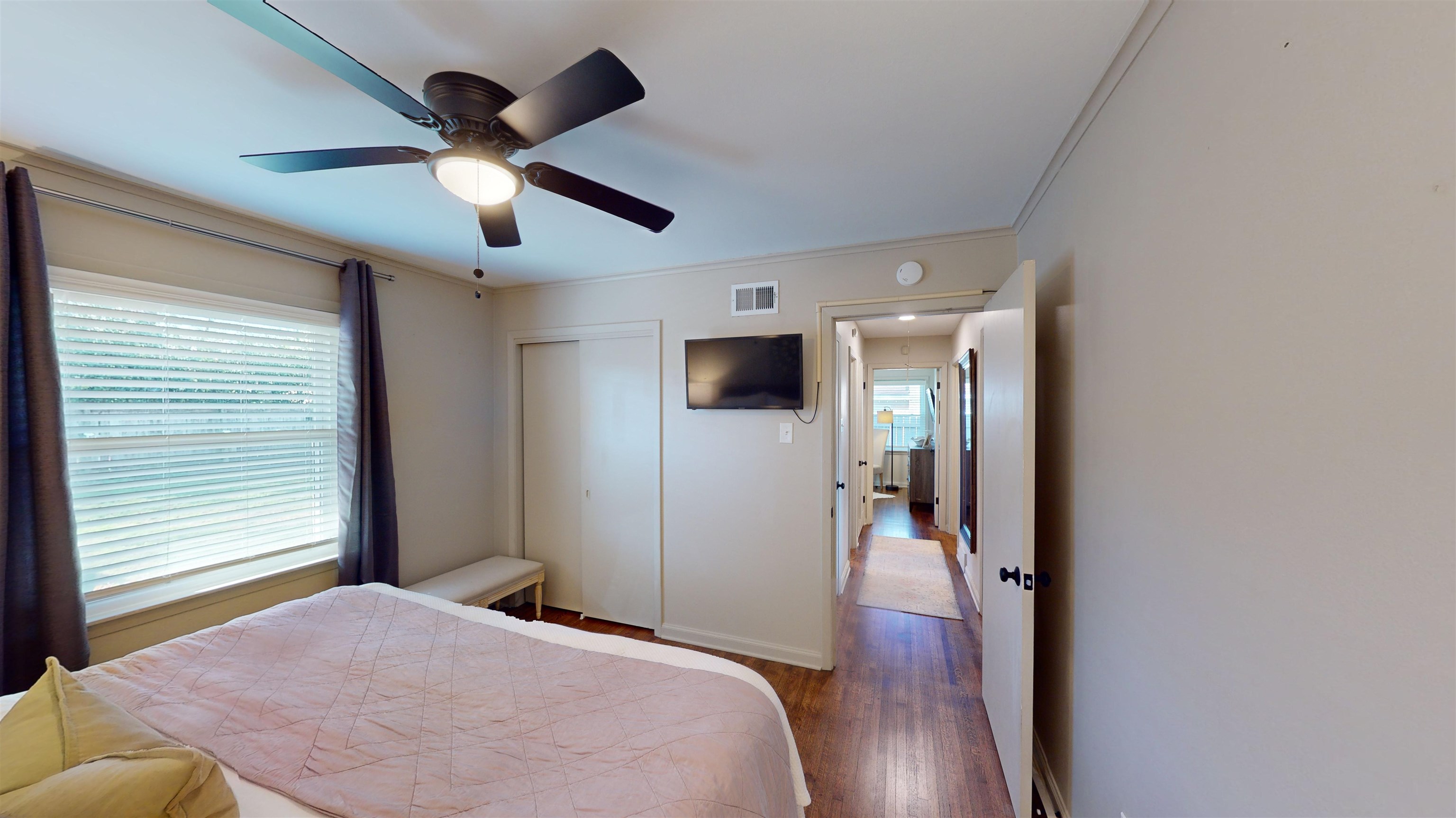 4779 Dee Road Memphis, TN 38117 - Photo 35 of 35 a bedroom with wooden floor and ceiling fan