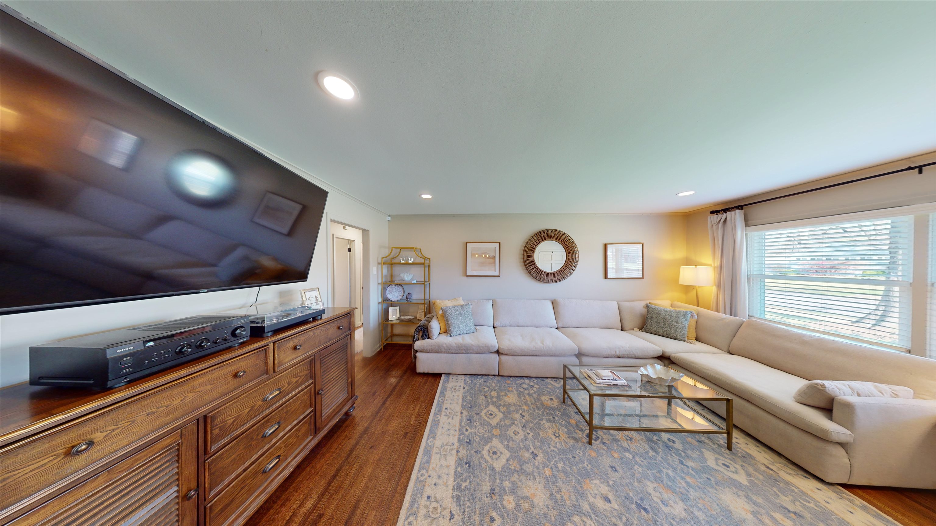 4779 Dee Road Memphis, TN 38117 - Photo 5 of 35 a living room with furniture and a flat screen tv