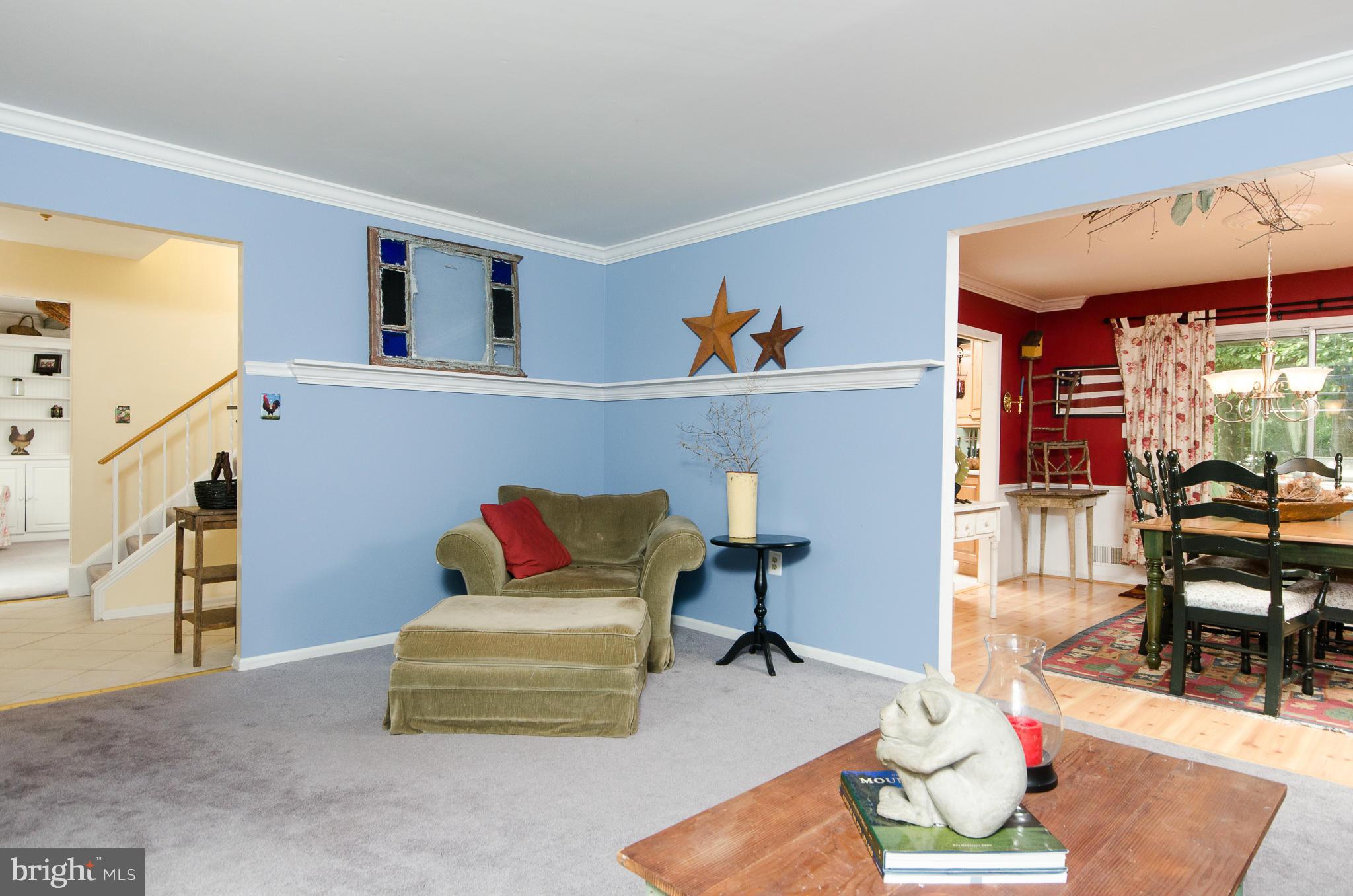 8402 Riverside Road Alexandria, VA 22308 - Photo 6 of 29 a living room with furniture and a flat screen tv