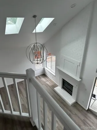 a view of entryway and kitchen