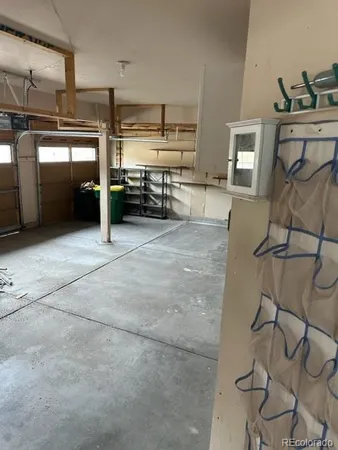 a view of a kitchen with appliances and cabinets