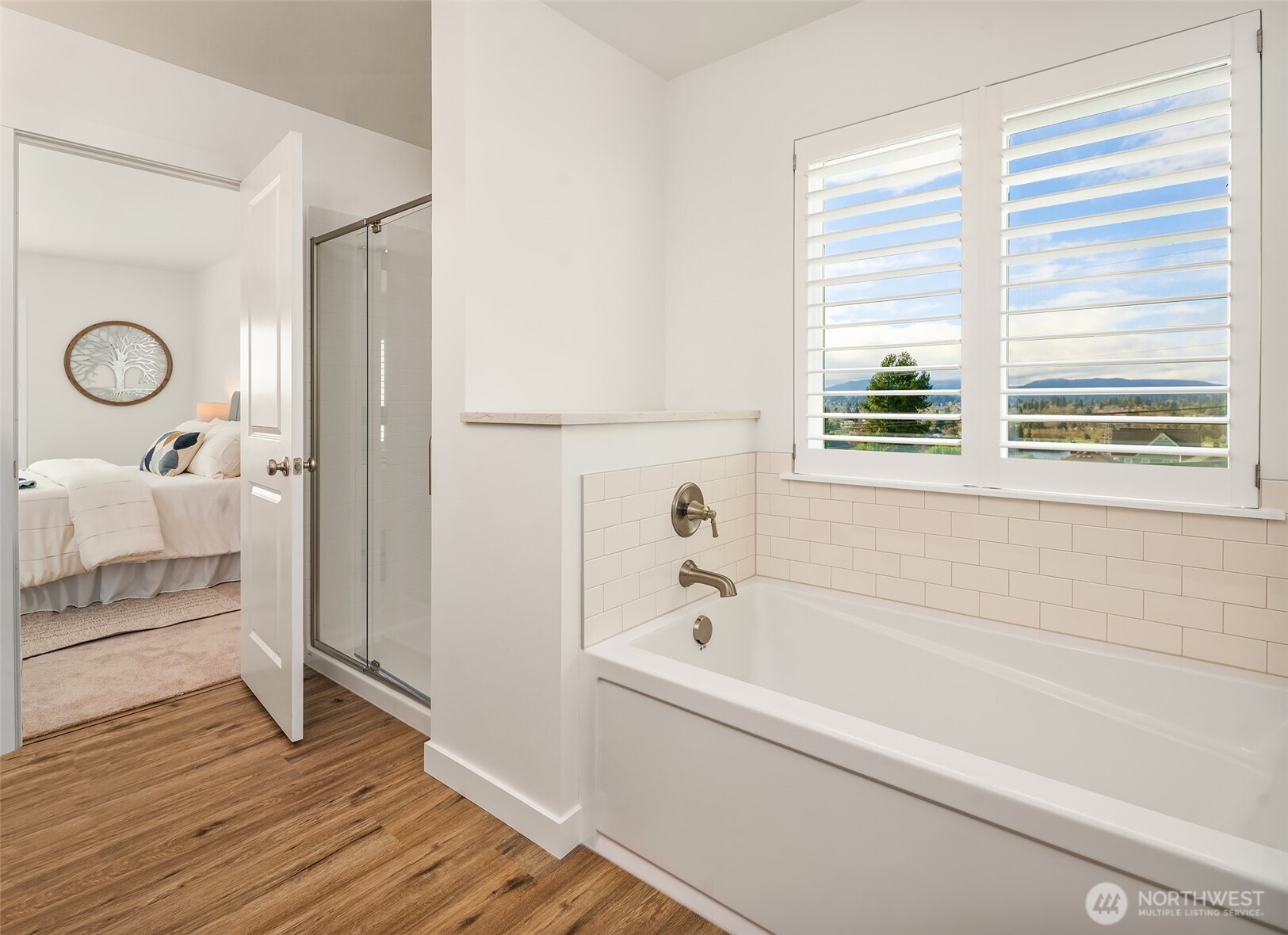 2401 East 16th Street Bremerton, WA 98310 - Photo 20 of 30 a bathroom with a bathtub and a shower