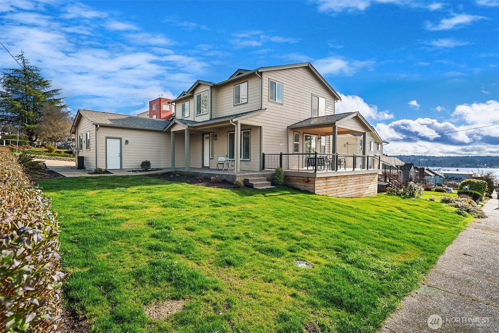 2401 East 16th Street Bremerton, WA 98310 - Photo 23 of 30 a front view of a house with a yard