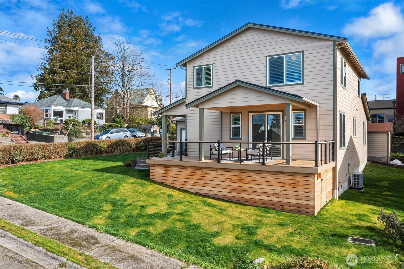 2401 East 16th Street Bremerton, WA 98310 - Photo 24 of 30 a view of a house with a yard and deck