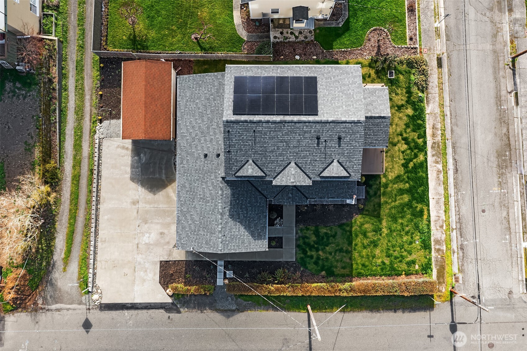 2401 East 16th Street Bremerton, WA 98310 - Photo 26 of 30 an aerial view of a house with a yard and potted plants