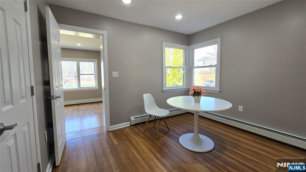 2-72 Saddle River Road Fair Lawn, NJ 07410 - Photo 11 of 33 a view of a livingroom with furniture window and wooden floor