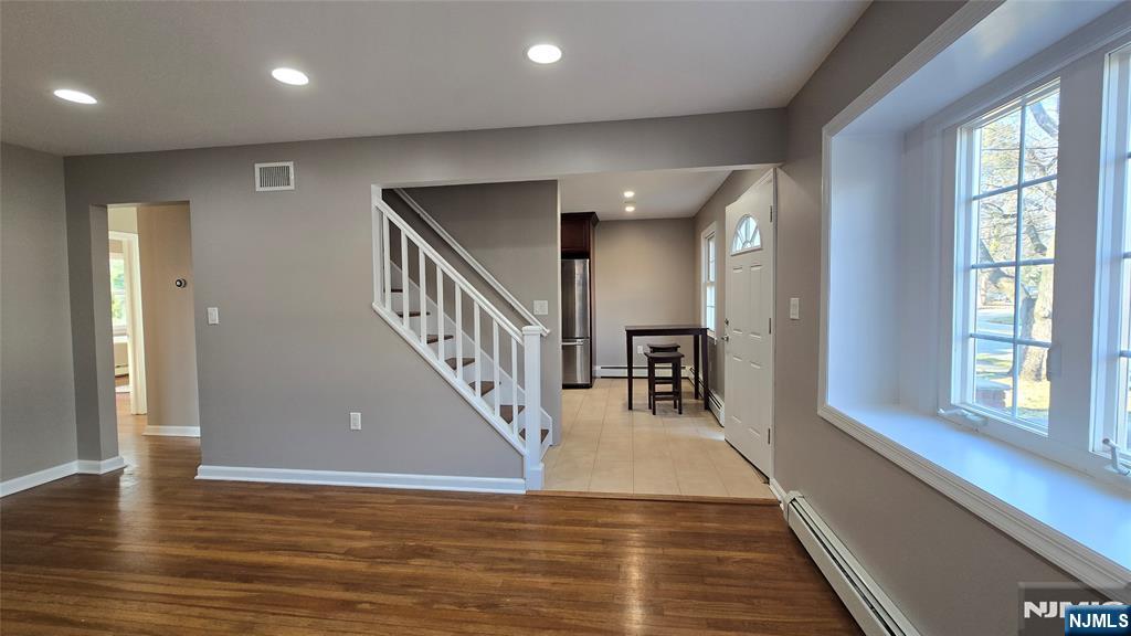 2-72 Saddle River Road Fair Lawn, NJ 07410 - Photo 2 of 33 a view of entryway and hall with wooden floor