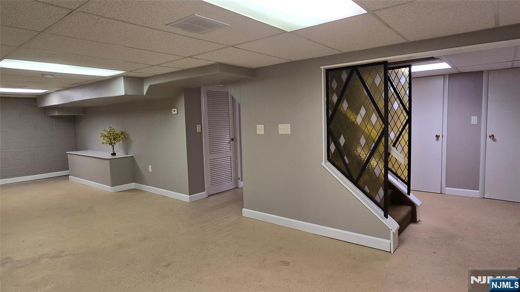 2-72 Saddle River Road Fair Lawn, NJ 07410 - Photo 22 of 33 a view of an empty room with wooden floor