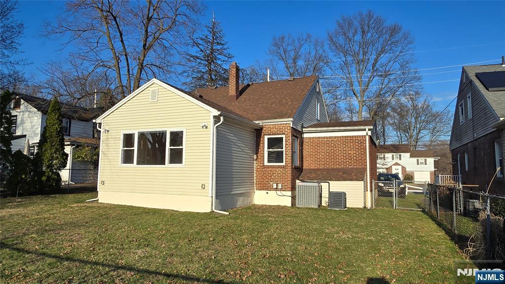 2-72 Saddle River Road Fair Lawn, NJ 07410 - Photo 26 of 33 a view of a house with backyard and sitting area