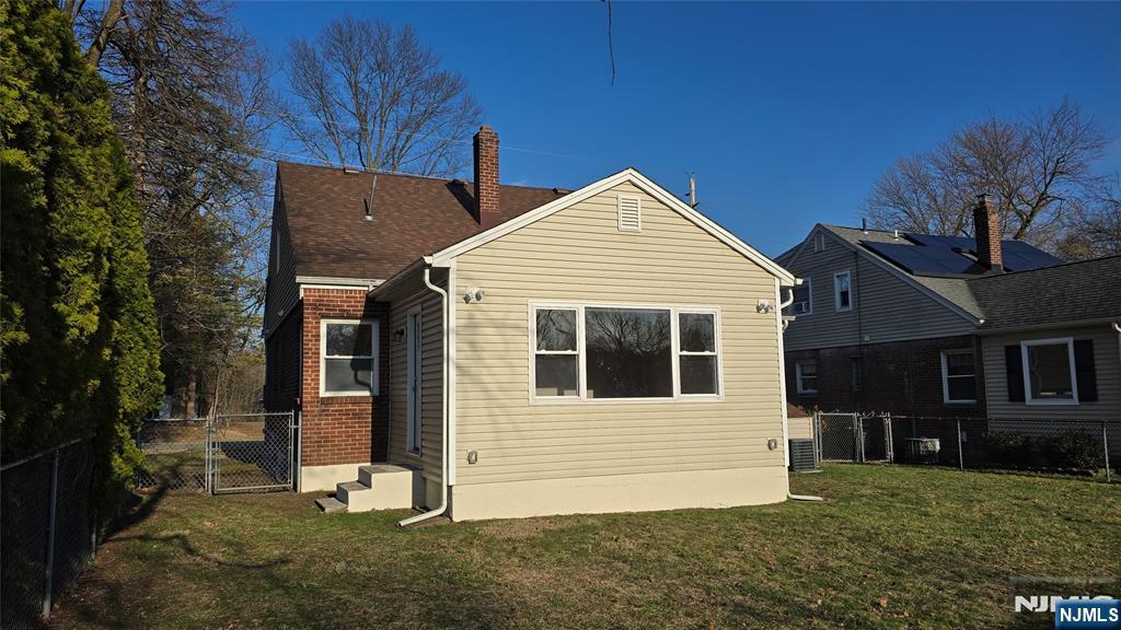 2-72 Saddle River Road Fair Lawn, NJ 07410 - Photo 27 of 33 a view of a house with a yard