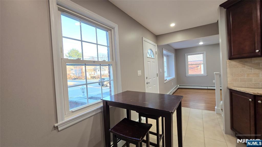 2-72 Saddle River Road Fair Lawn, NJ 07410 - Photo 5 of 33 a view of a dining room with furniture and window