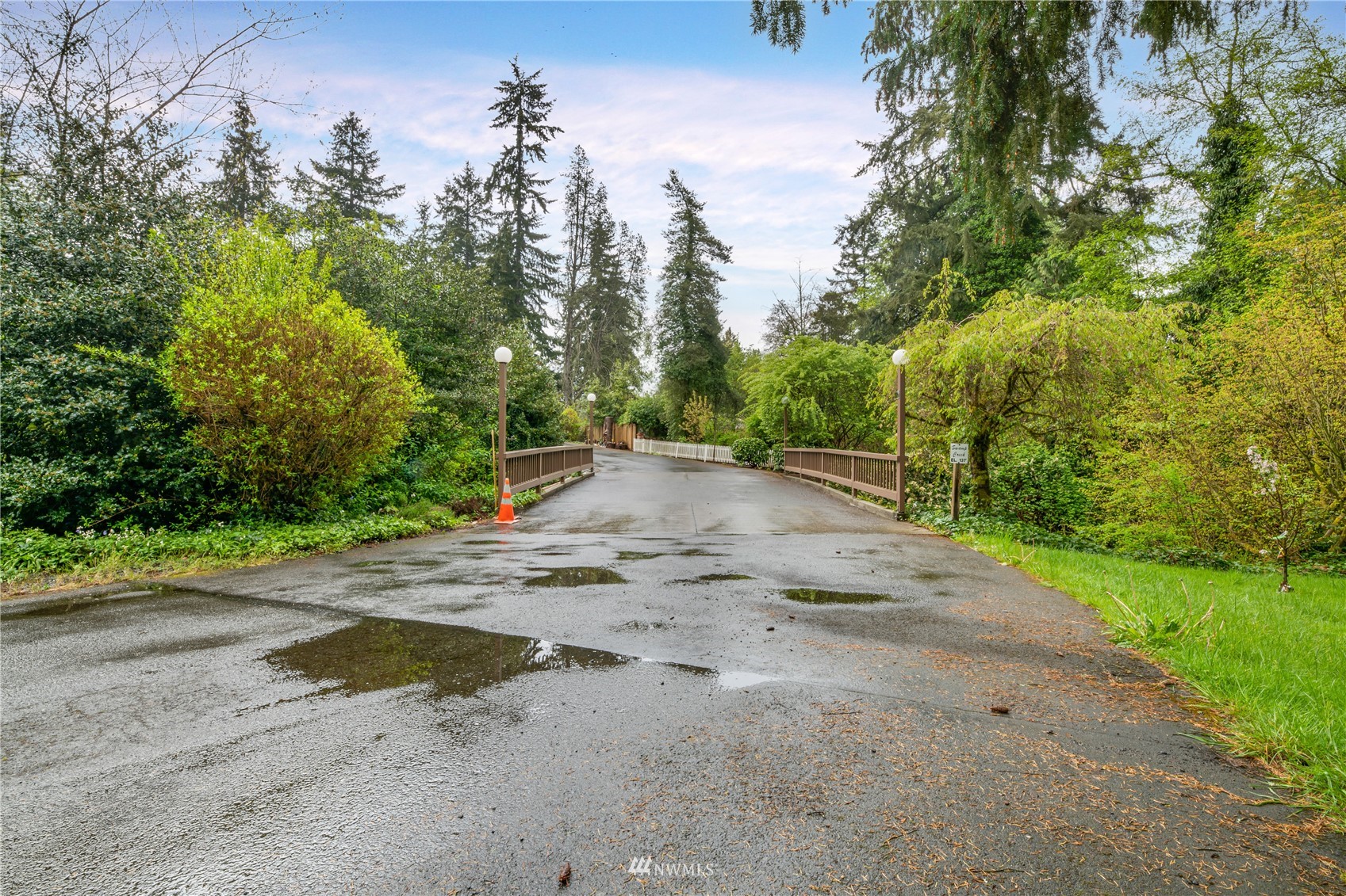 23231 Locust Way Bothell, WA 98021 - Photo 16 of 21 a view of a dirt road with trees in the background