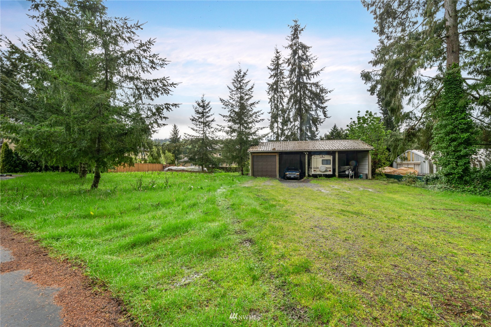 23231 Locust Way Bothell, WA 98021 - Photo 17 of 21 a front view of a house with a garden