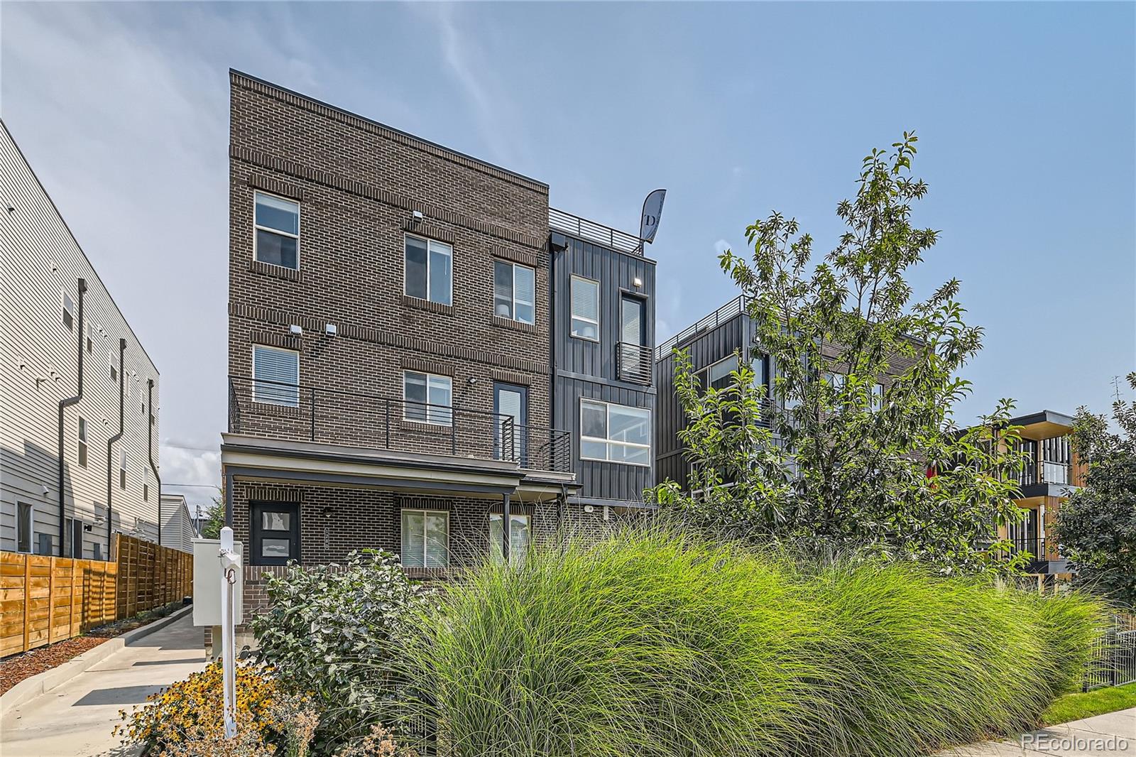1284 Stuart Street Denver, CO 80204 - Photo 2 of 43 a house view with a garden space