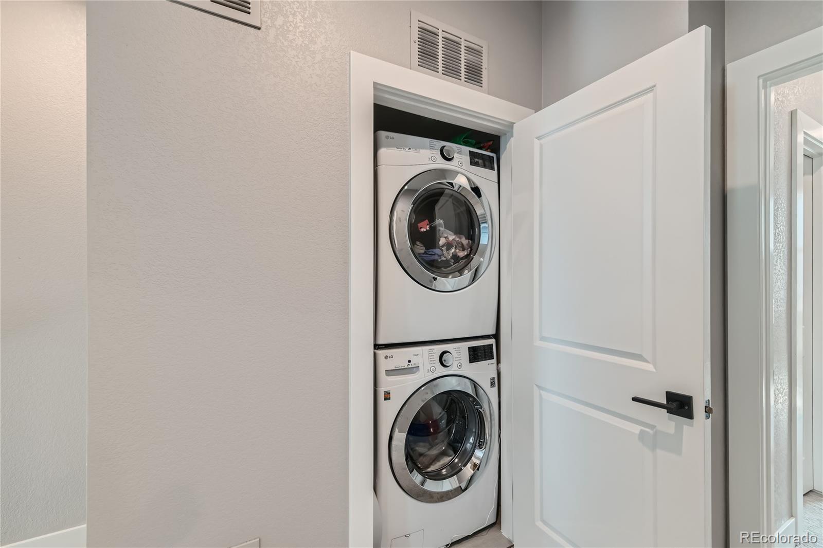 1284 Stuart Street Denver, CO 80204 - Photo 27 of 43 a utility room with dryer and washer