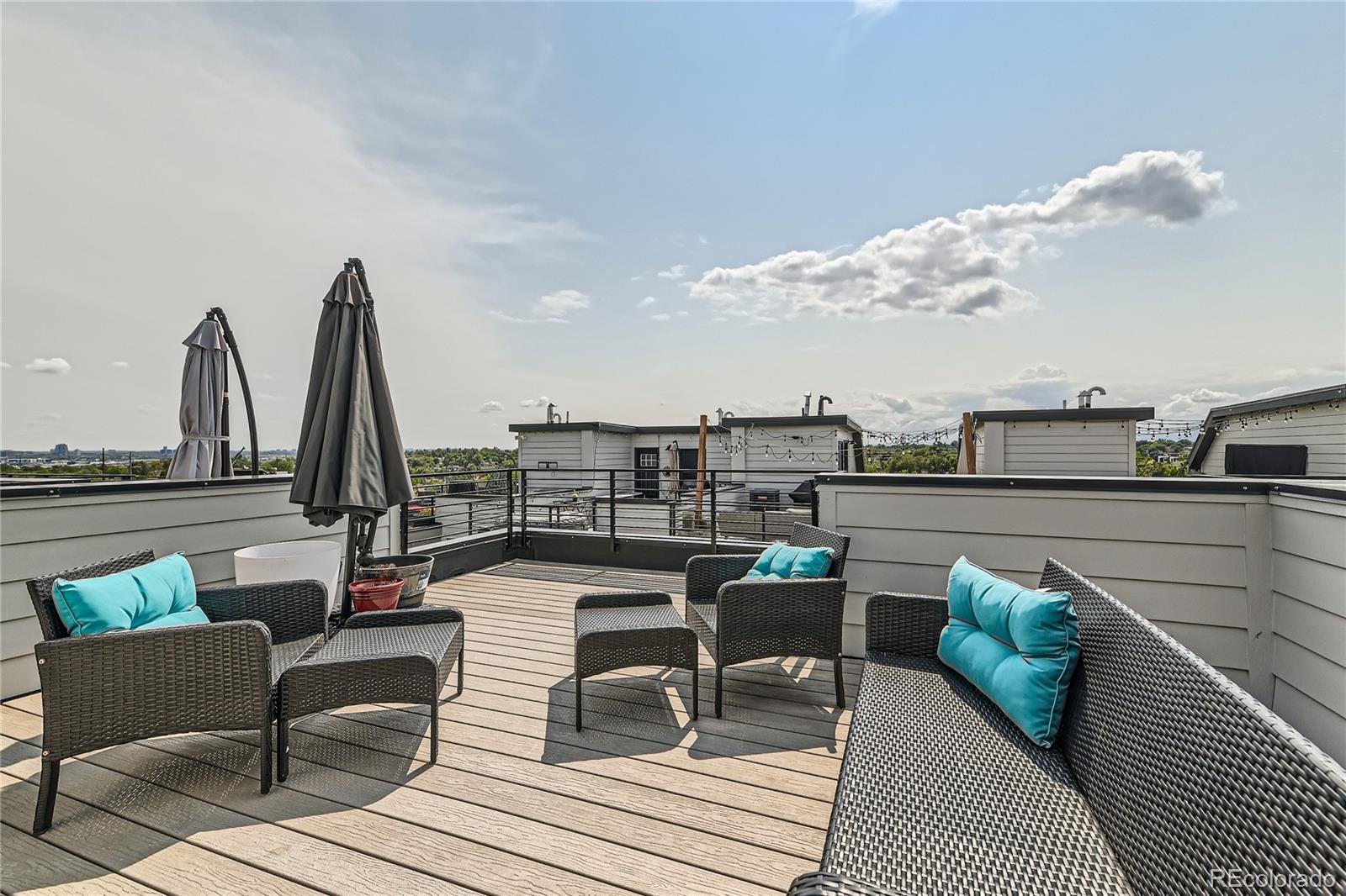 1284 Stuart Street Denver, CO 80204 - Photo 28 of 43 a view of roof deck with seating space
