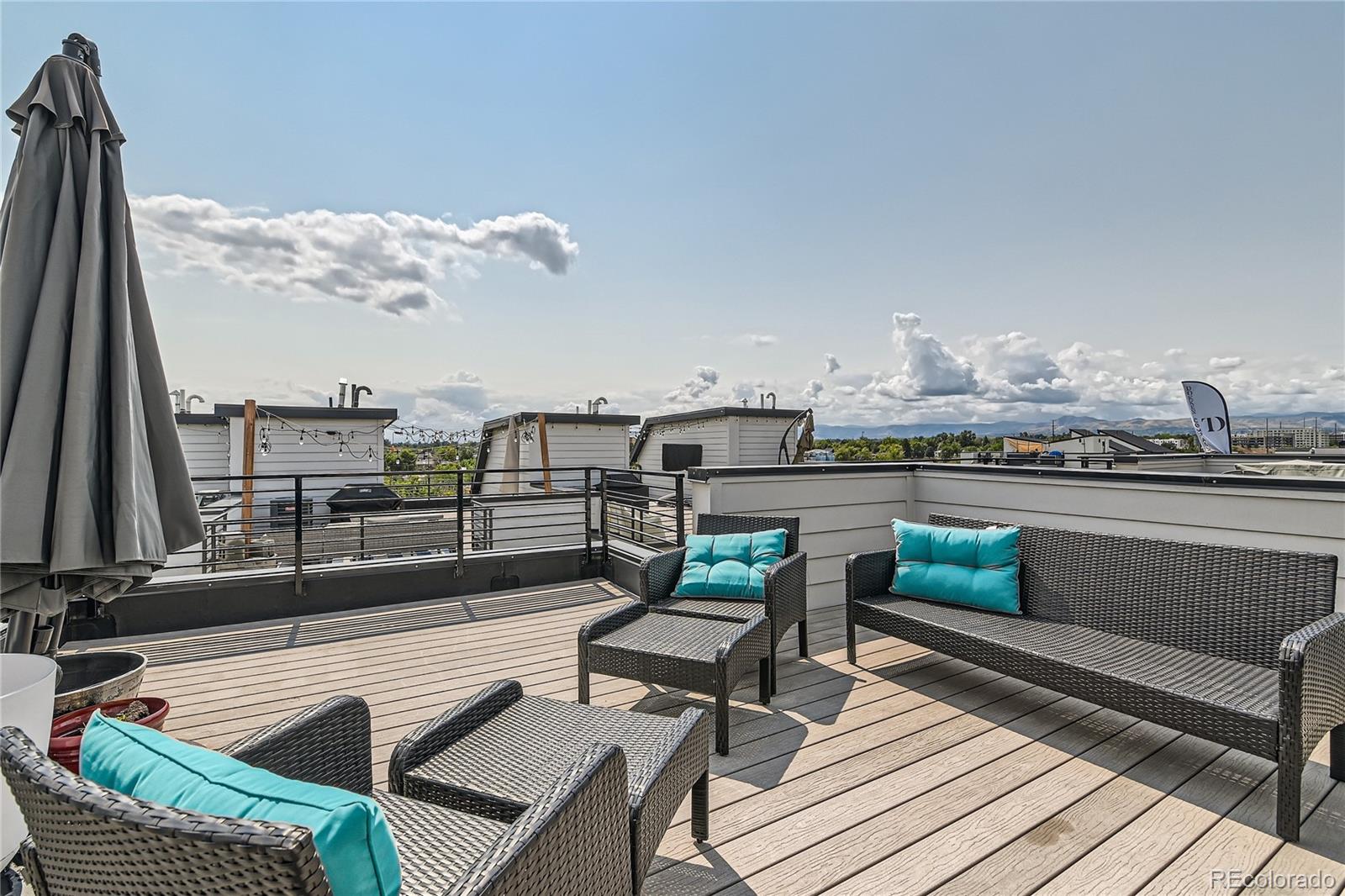 1284 Stuart Street Denver, CO 80204 - Photo 29 of 43 a view of a terrace with seating area