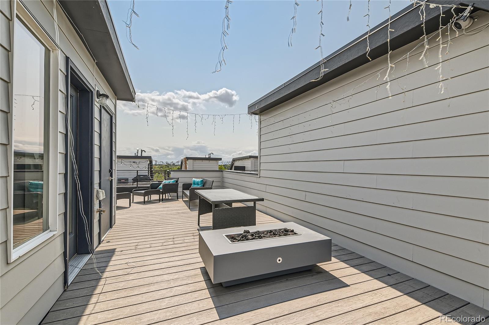 1284 Stuart Street Denver, CO 80204 - Photo 31 of 43 a view of a patio on the roof deck