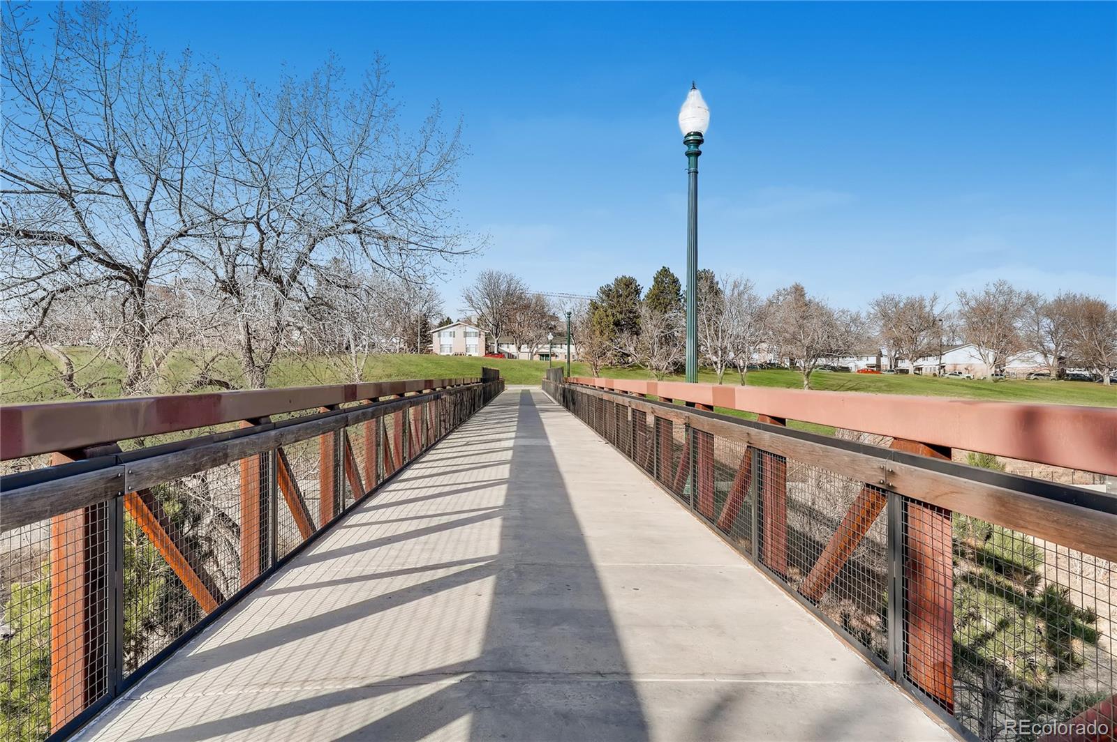 1284 Stuart Street Denver, CO 80204 - Photo 37 of 43 a view of a balcony with wooden fence