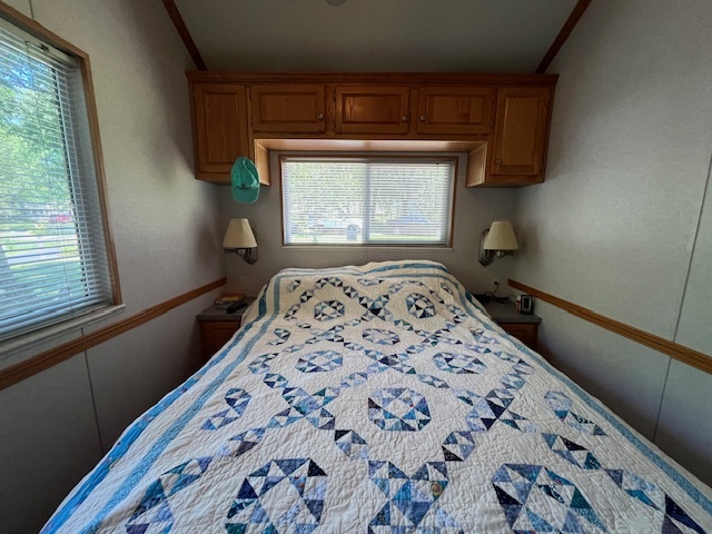 2795 East 28th Road Marseilles, IL 61341 - Photo 17 of 65 a bedroom with a bed and a window