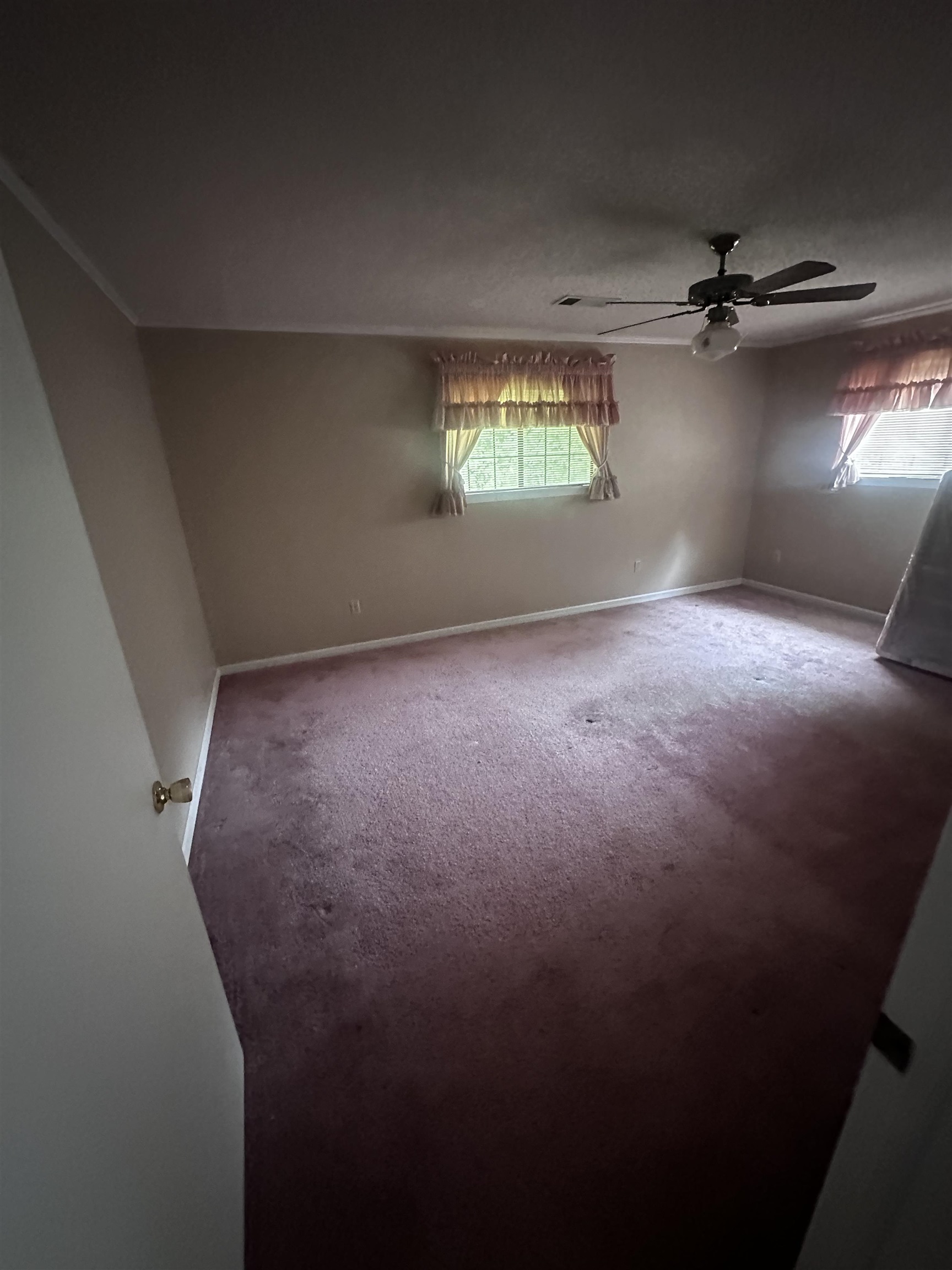 1865 Bartlett Road Memphis, TN 38134 - Photo 13 of 26 wooden floor in an empty room with a window
