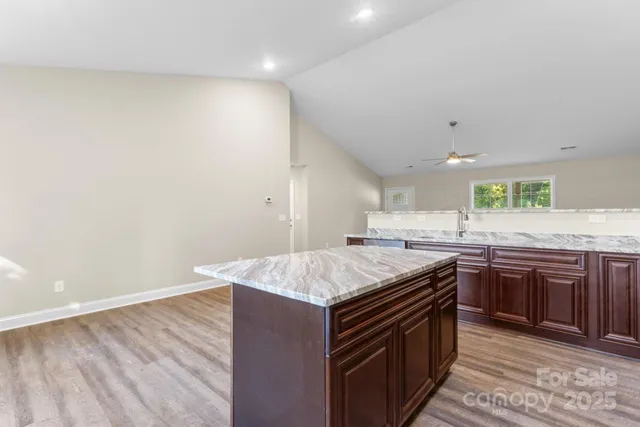 a kitchen with a stove and a sink