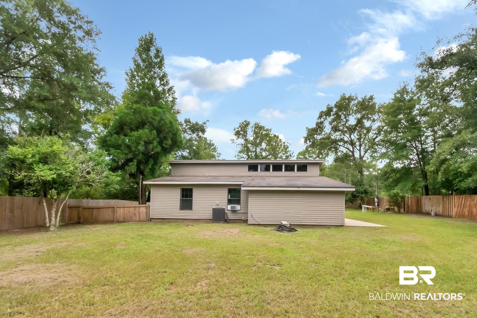 15060 Starlight Avenue Wilmer, AL 36587 - Photo 10 of 12 Back of property featuring a yard