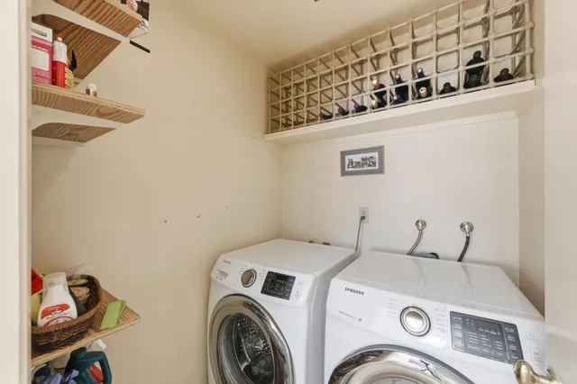 a utility room with dryer and washer