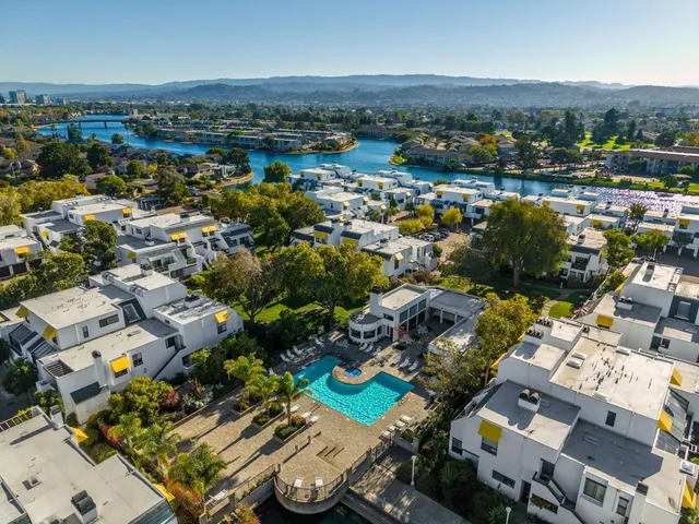 an aerial view of a city with lots of residential buildings