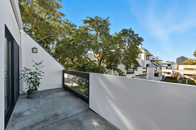 a view of a street from a balcony