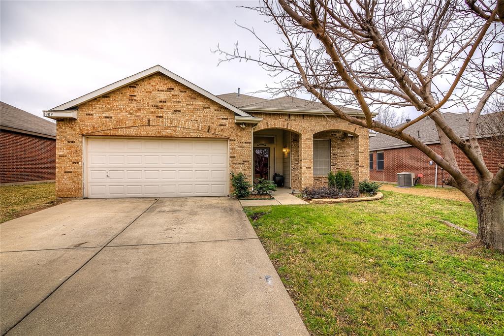 1309 Riverside Road Roanoke, TX 76262 - Photo 1 of 1 a front view of a house with garden