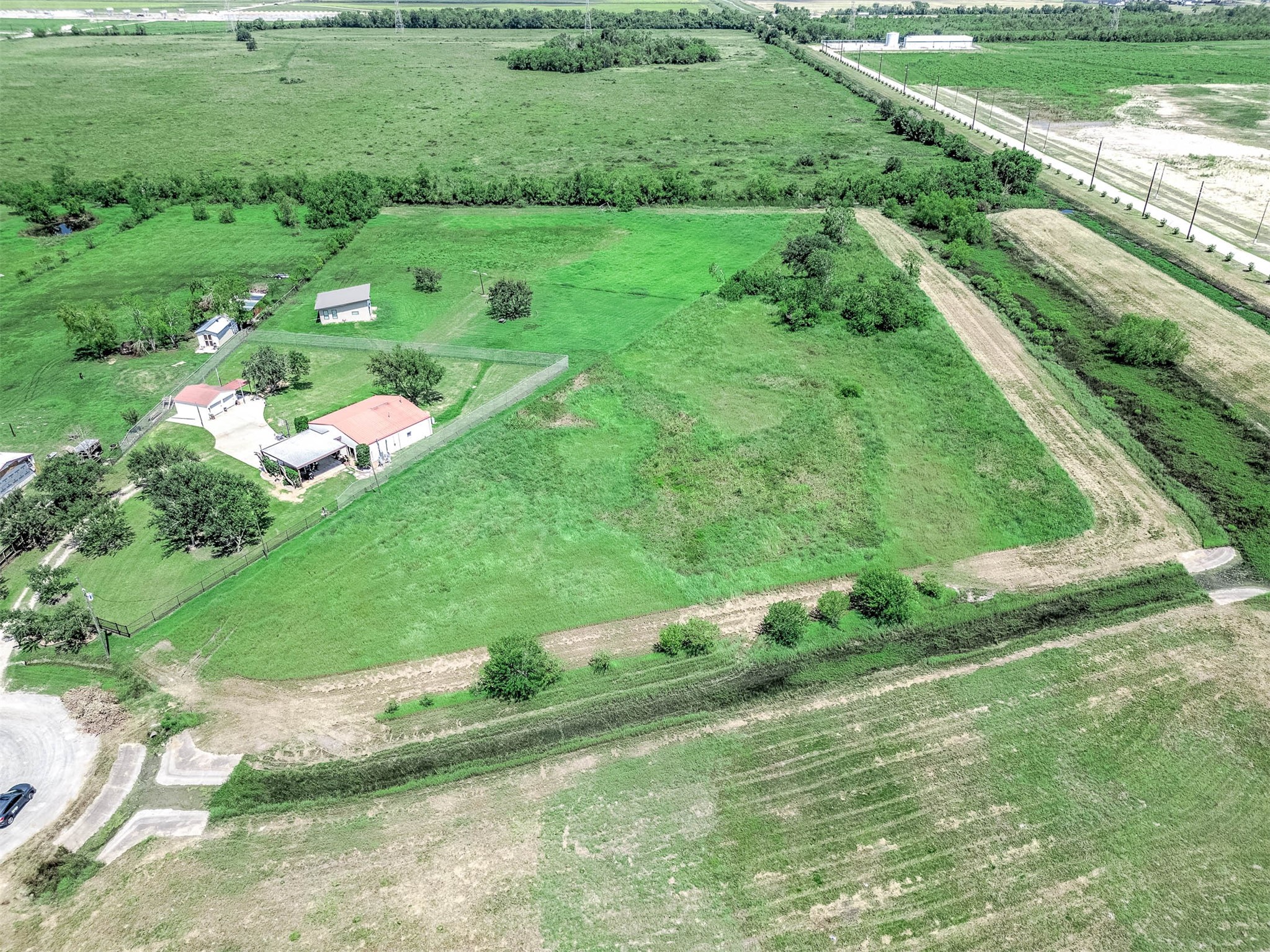 14411 Austin Bayou Drive Rosharon, TX 77583 - Photo 5 of 15 a lush green field with lots of green space