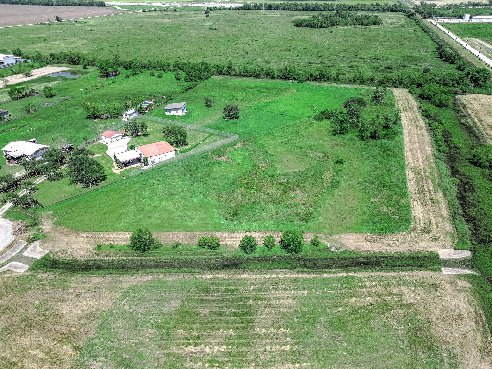 14411 Austin Bayou Drive Rosharon, TX 77583 - Photo 7 of 15 a green field with lots of green space
