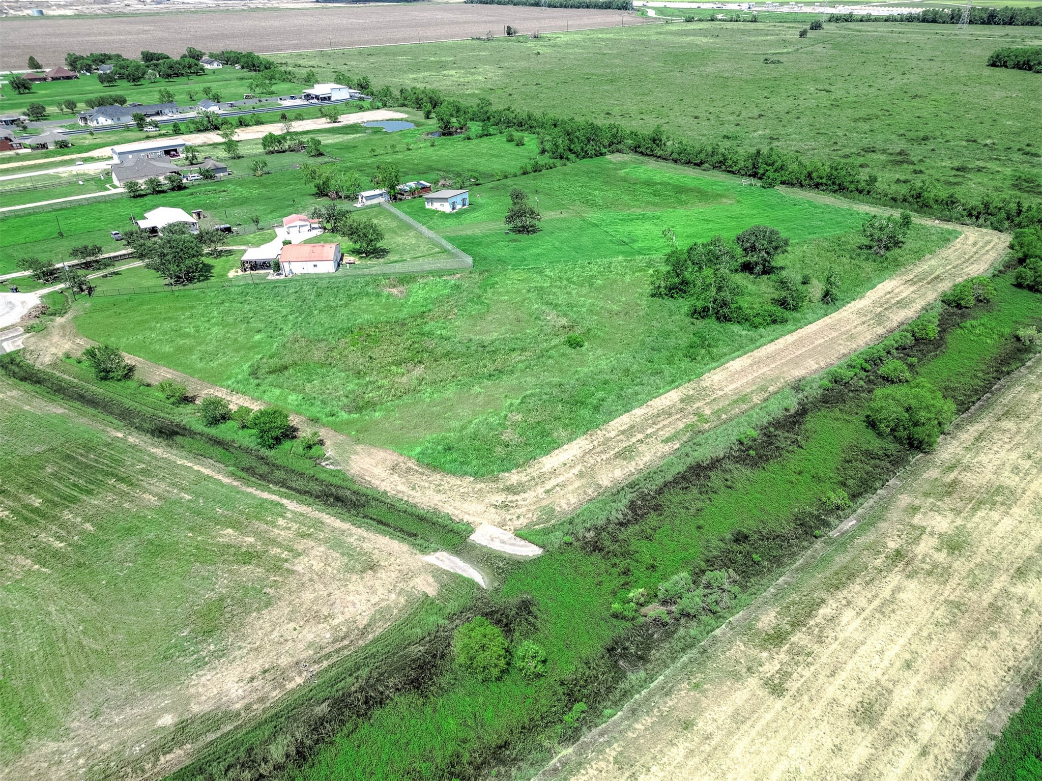 14411 Austin Bayou Drive Rosharon, TX 77583 - Photo 8 of 15 a lush green field with lots of green space