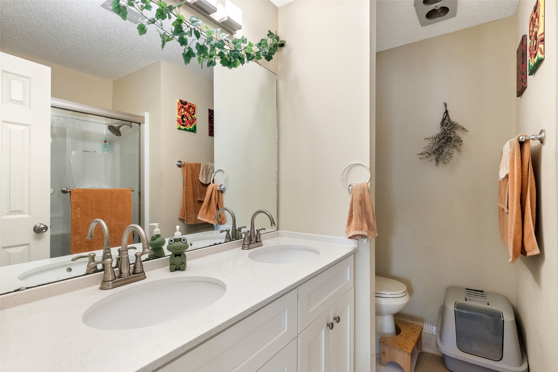 806 West 24th Street, Unit 328 Austin, TX 78705 - Photo 11 of 21 a bathroom with a sink toilet and shower