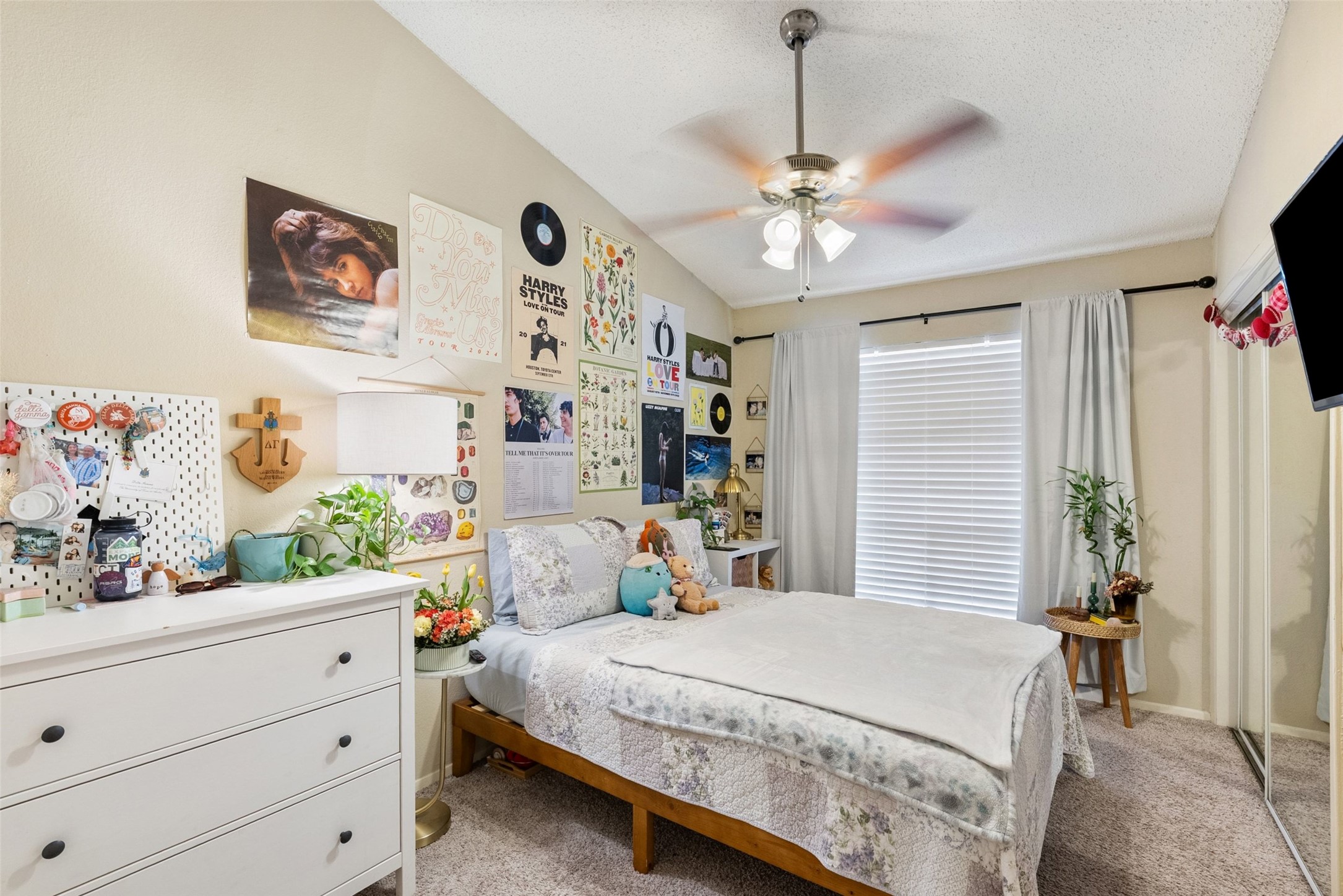 806 West 24th Street, Unit 328 Austin, TX 78705 - Photo 13 of 21 a bedroom with a bed and a window