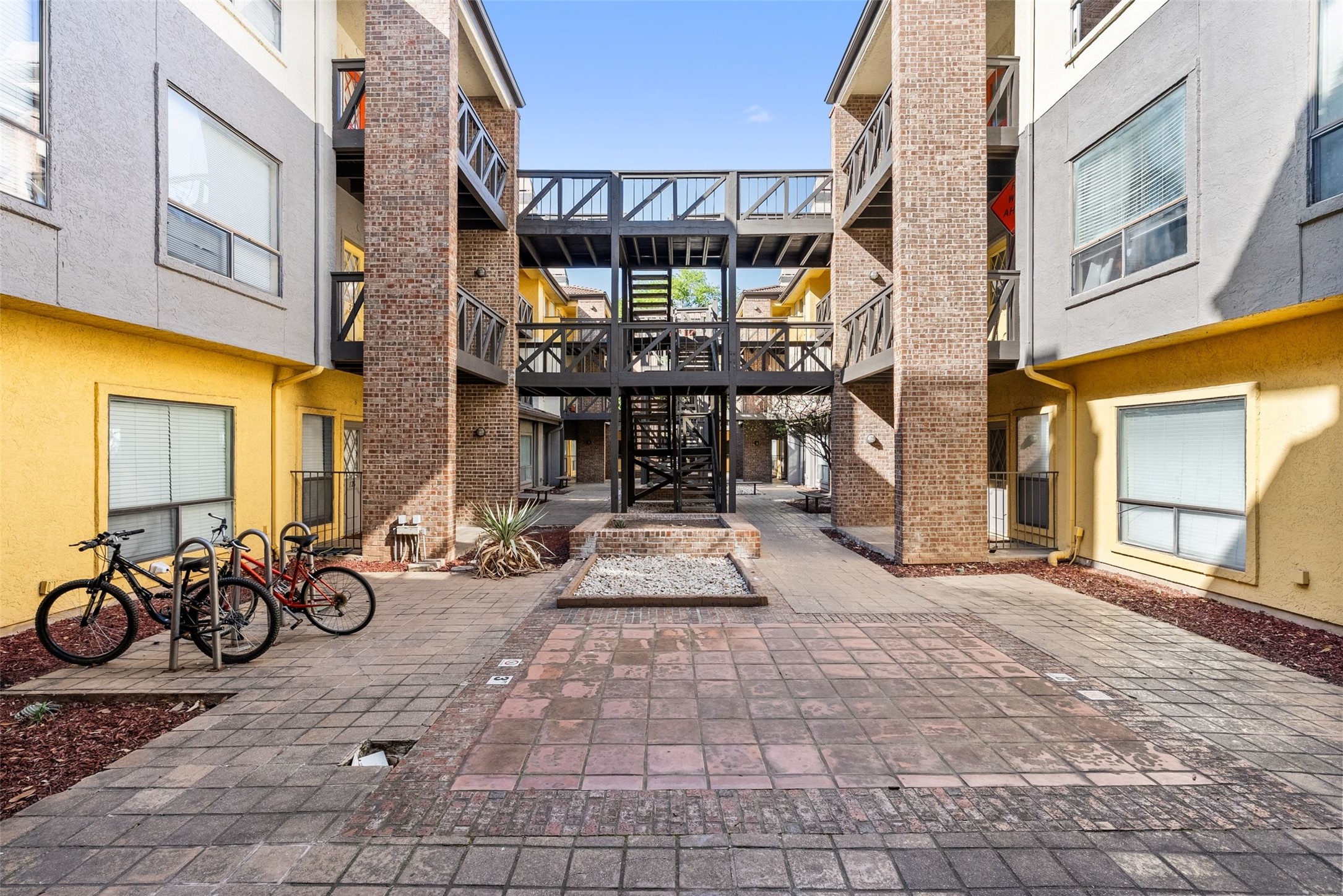 806 West 24th Street, Unit 328 Austin, TX 78705 - Photo 18 of 21 a view of a brick building with many windows