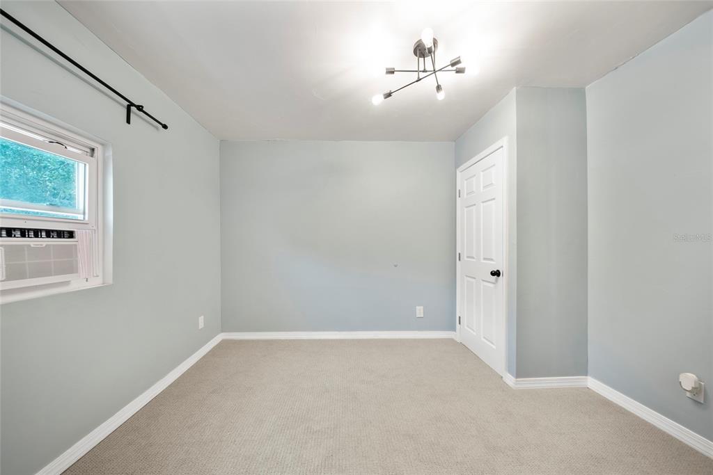 4622 Paloverde Drive New Port Richey, FL 34652 - Photo 13 of 22 a view of an empty room with a window