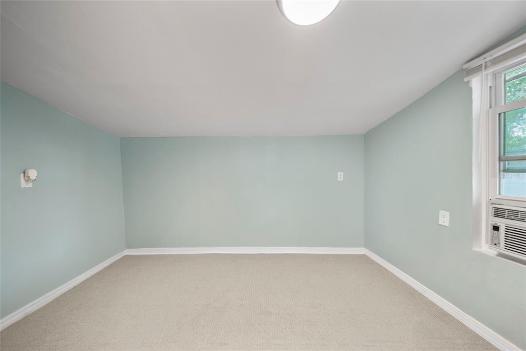 4622 Paloverde Drive New Port Richey, FL 34652 - Photo 19 of 22 a view of an empty room with a window