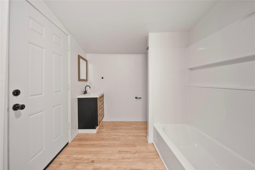 4622 Paloverde Drive New Port Richey, FL 34652 - Photo 21 of 22 a bathroom with a bathtub and a shower