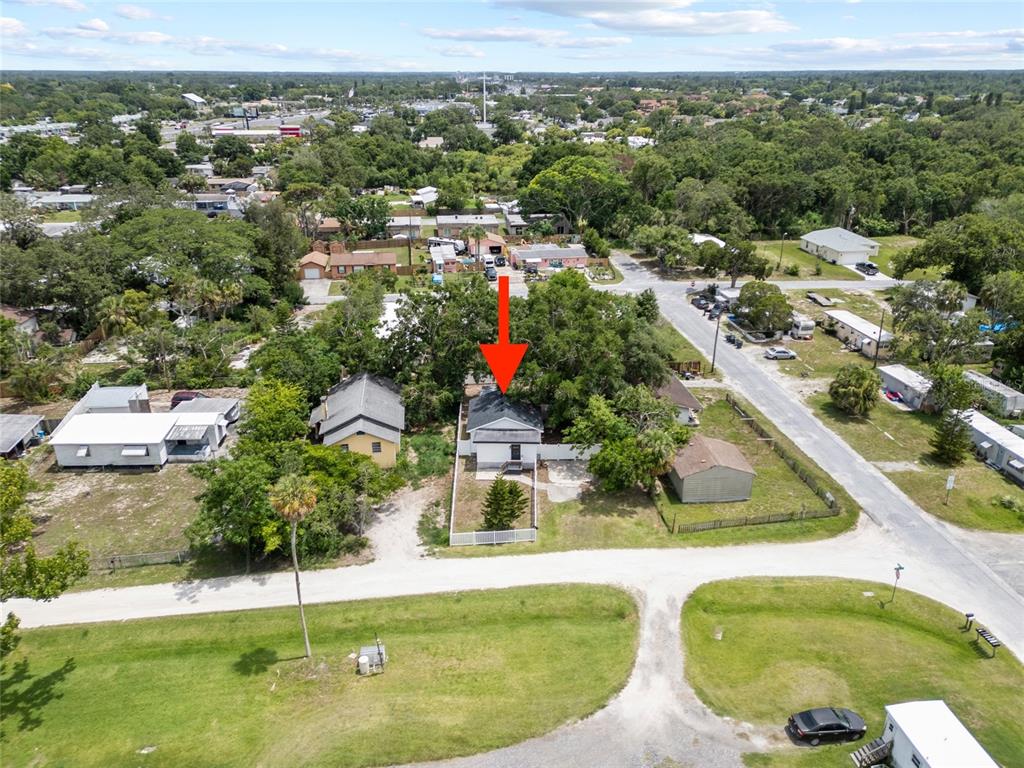 4622 Paloverde Drive New Port Richey, FL 34652 - Photo 22 of 22 an aerial view of residential houses with outdoor space and swimming pool